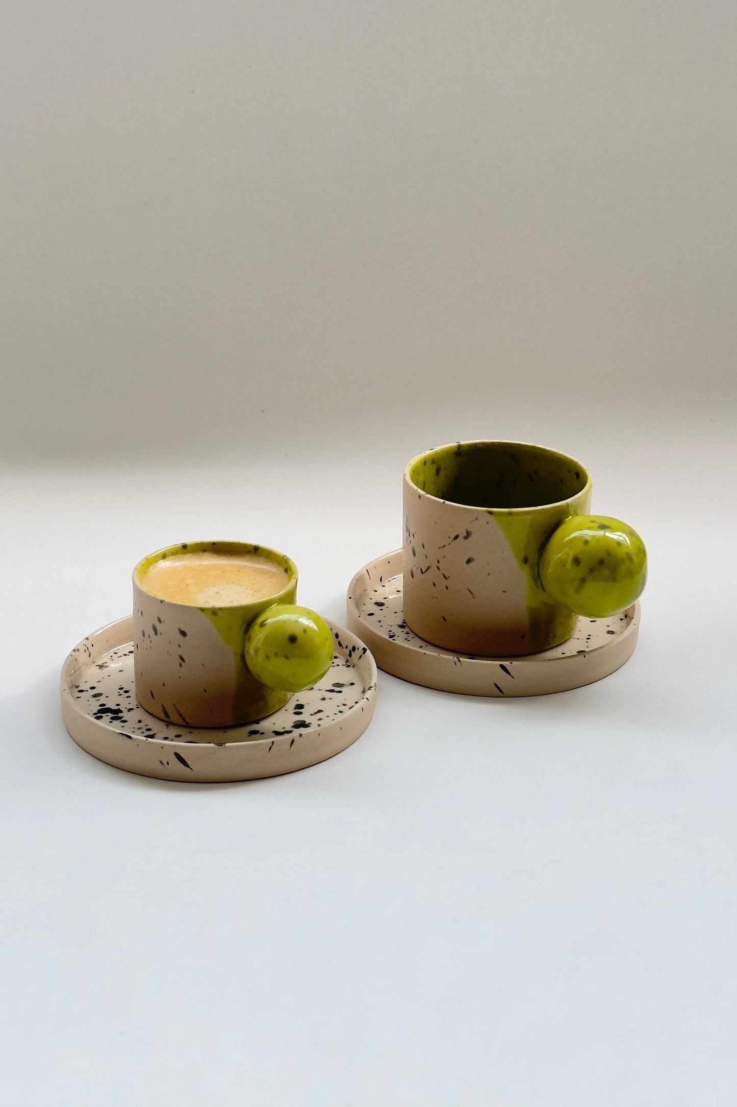 150 ml Beige with green colour ball handle cup and saucer set