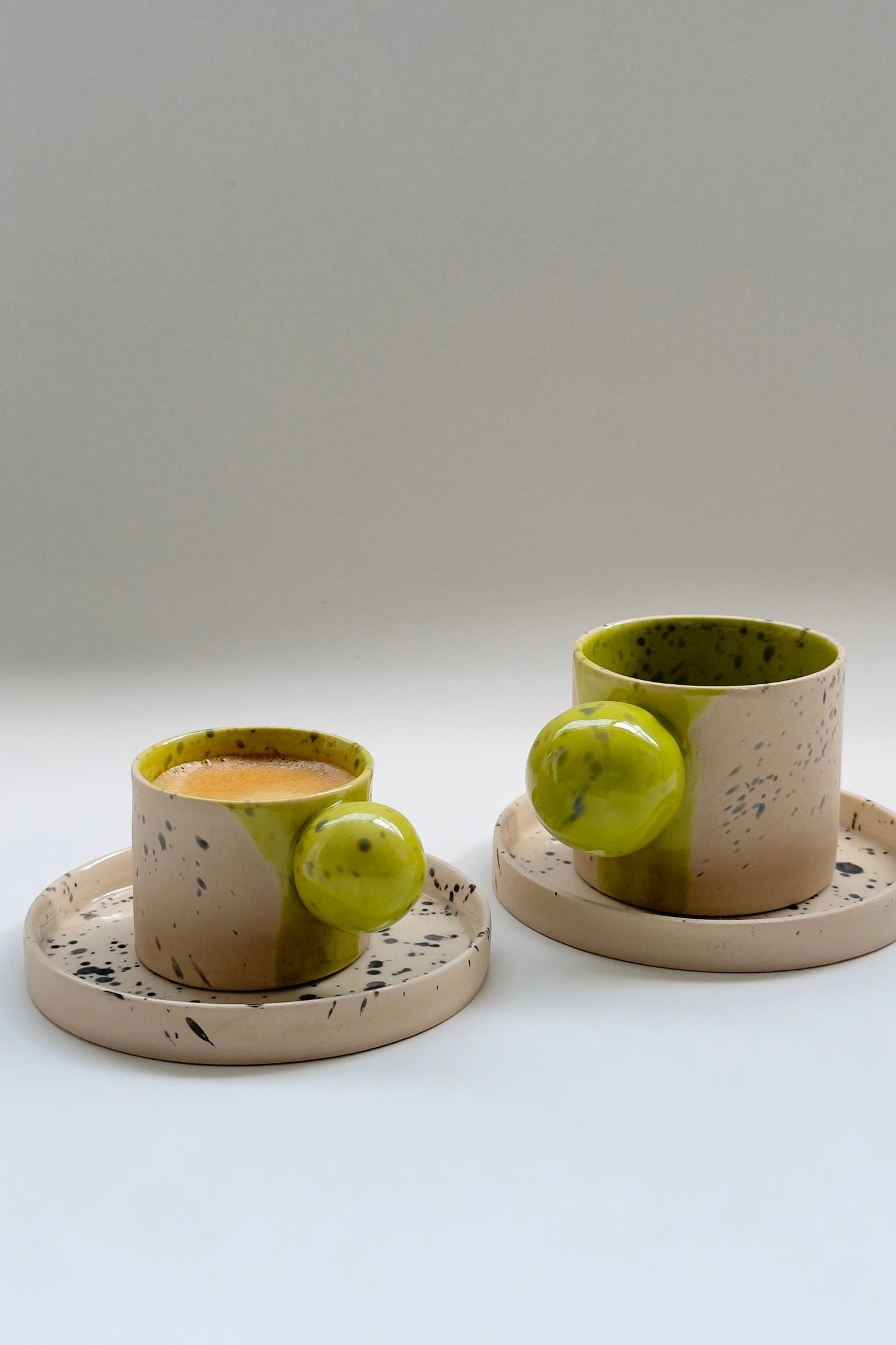 150 ml Beige with green colour ball handle cup and saucer set