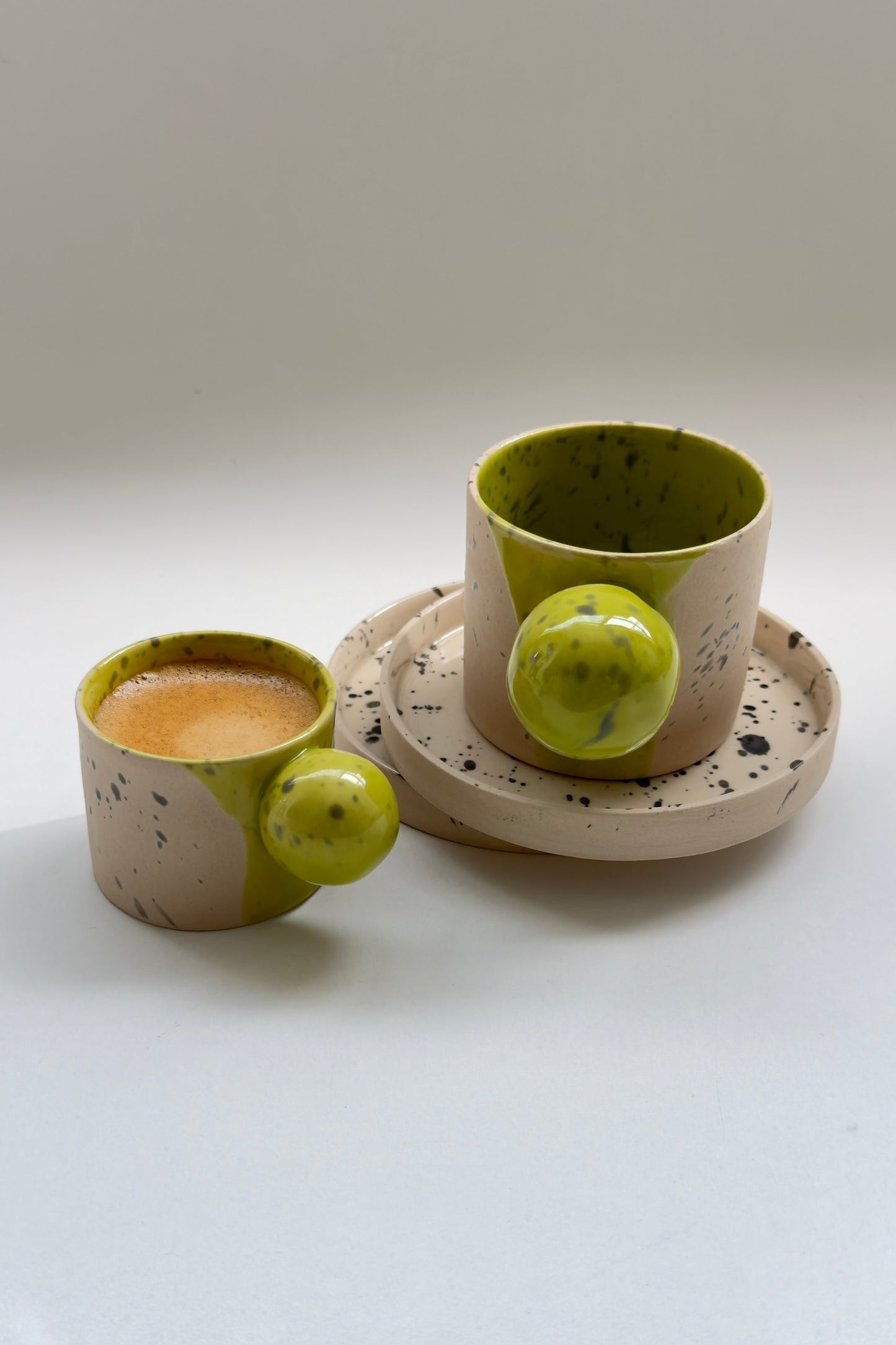 150 ml Beige with green colour ball handle cup and saucer set