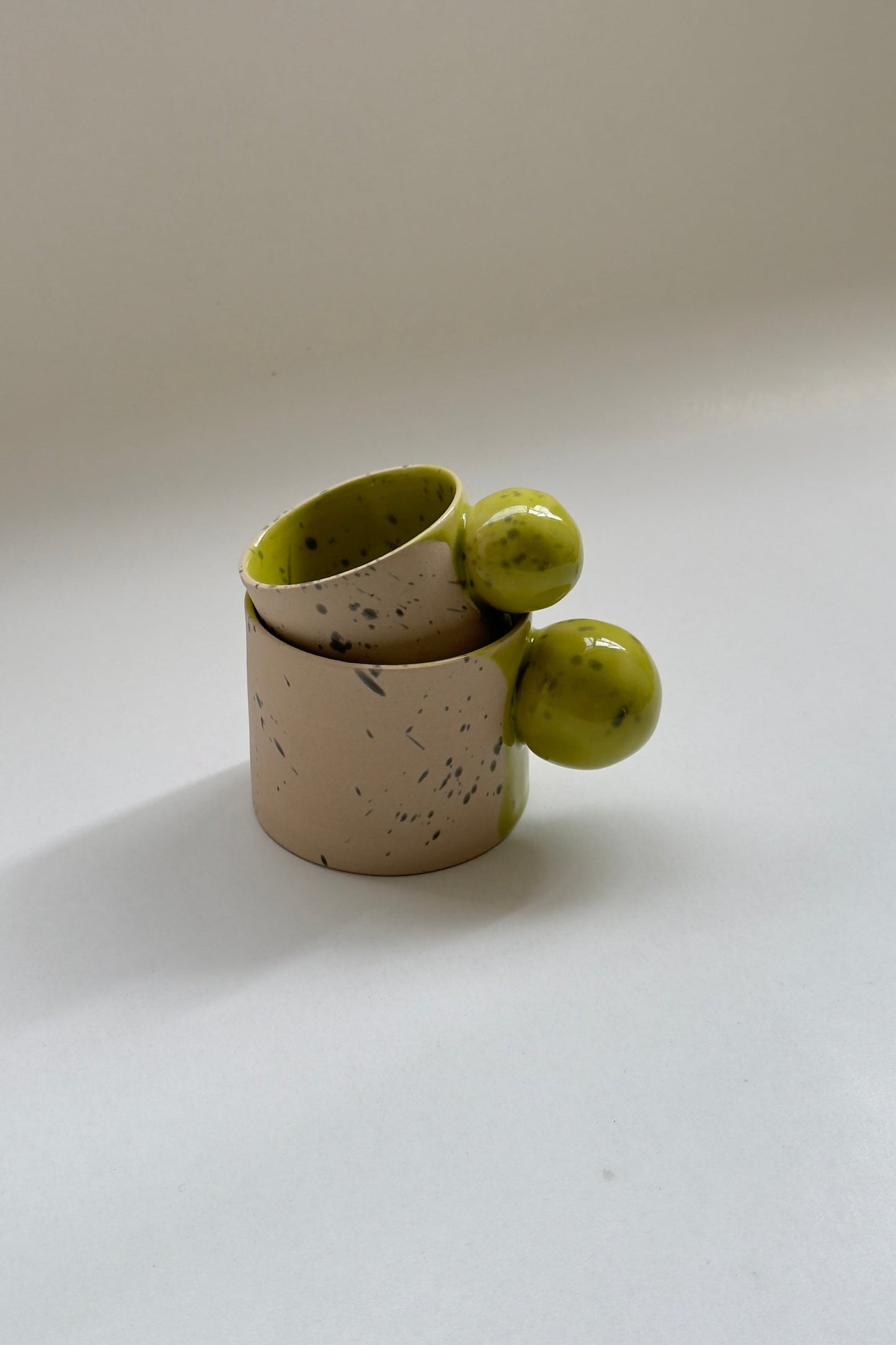 150 ml Beige with green colour ball handle cup and saucer set