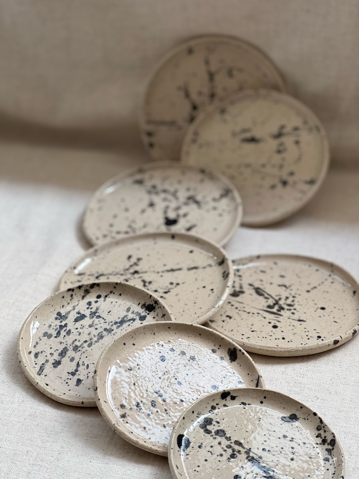 Stoneware 14 cm black splashed saucer