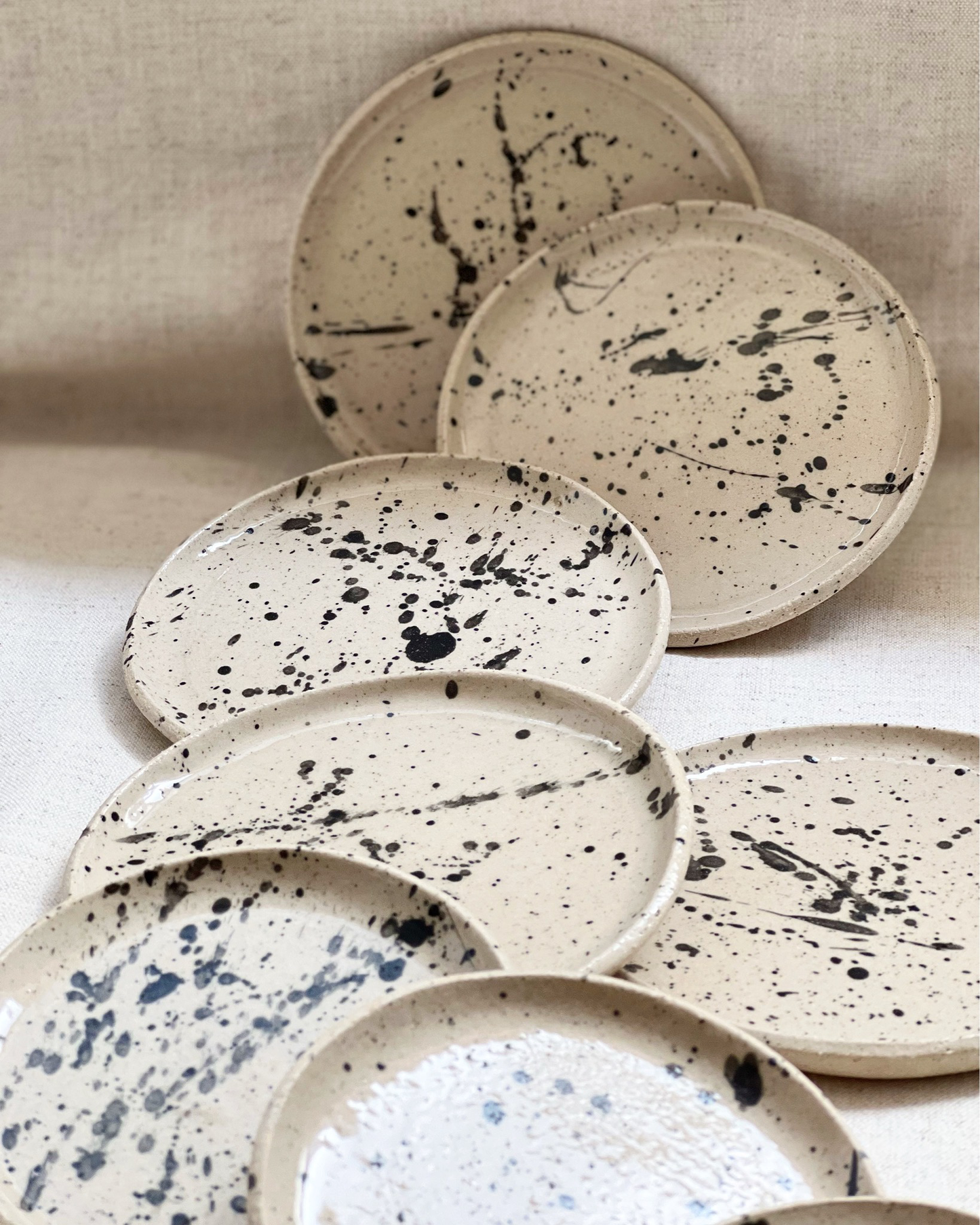 Stoneware 14 cm black splashed saucer