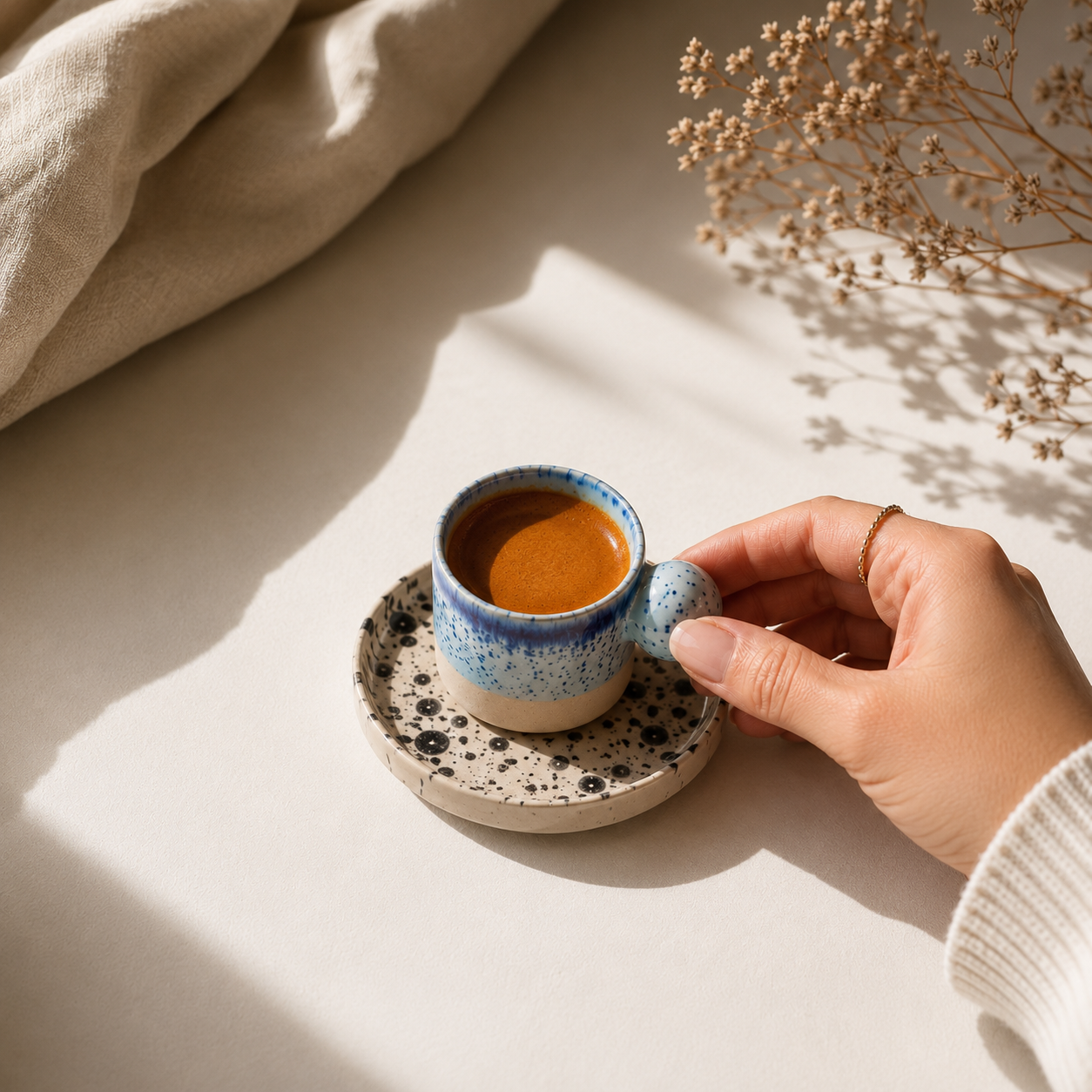 Close up of handmade stoneware espresso cup texture and glaze