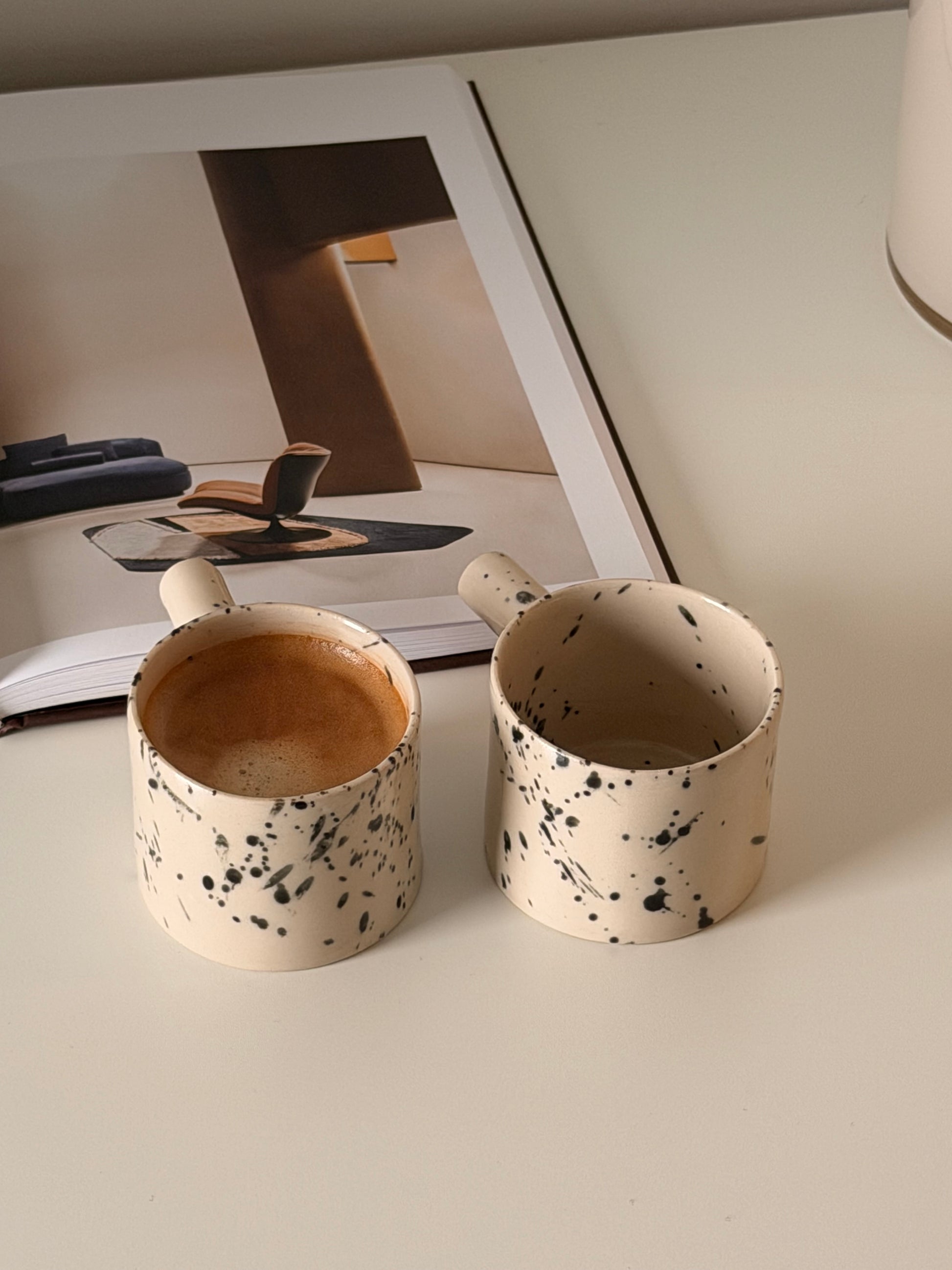 Artisan stoneware coffee cups with comfortable handles
