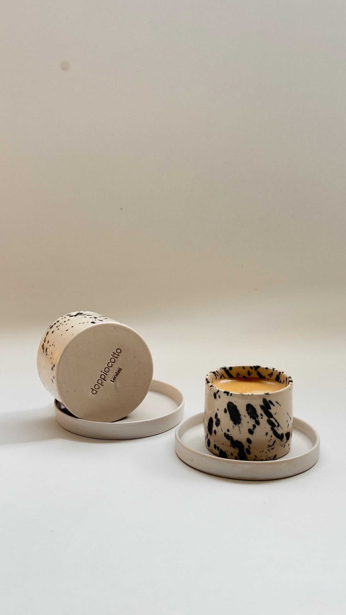 Handmade 2 oz handleless stoneware espresso cup with matching saucer
