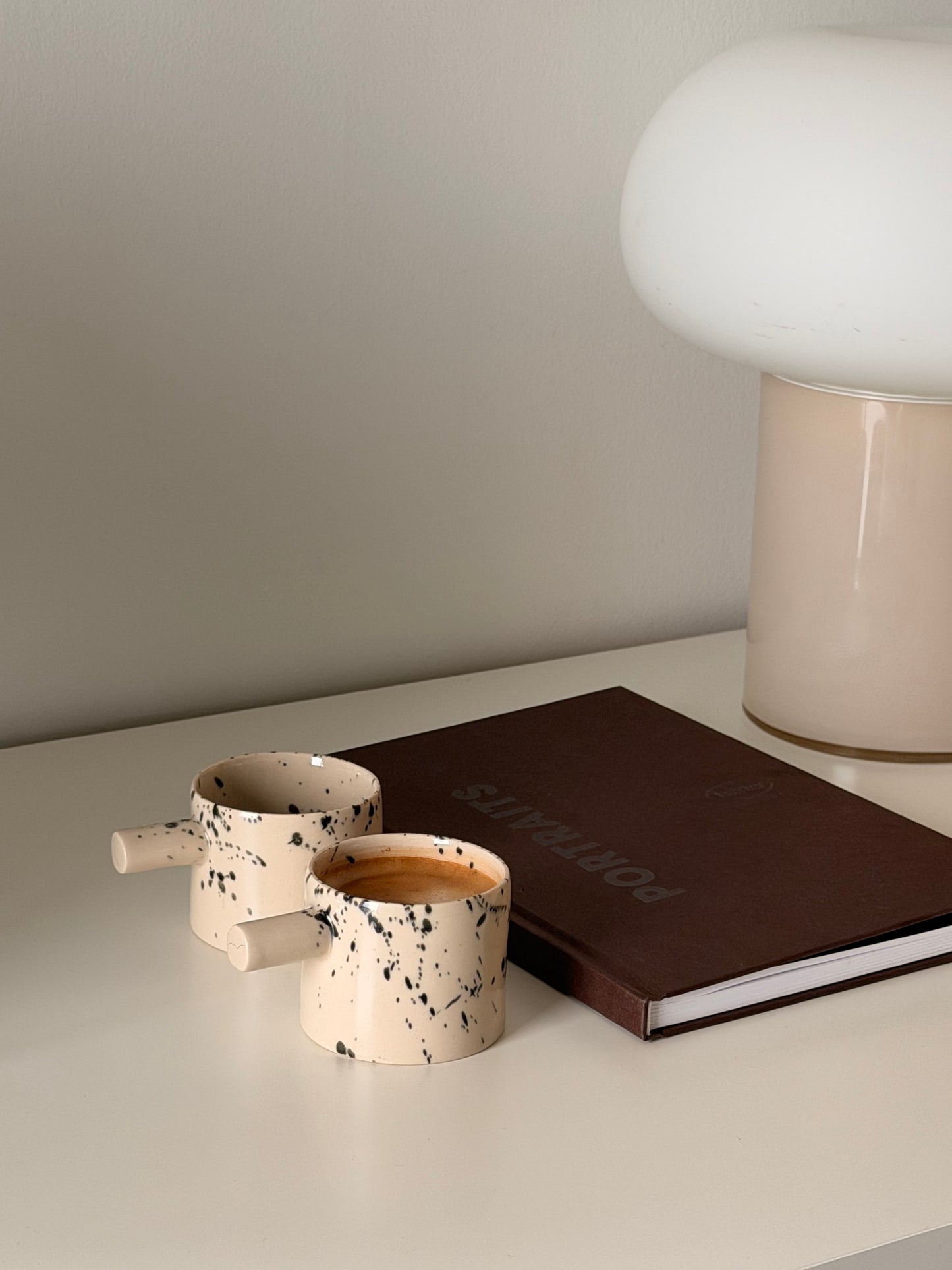 Handmade espresso cup set styled for modern coffee moments