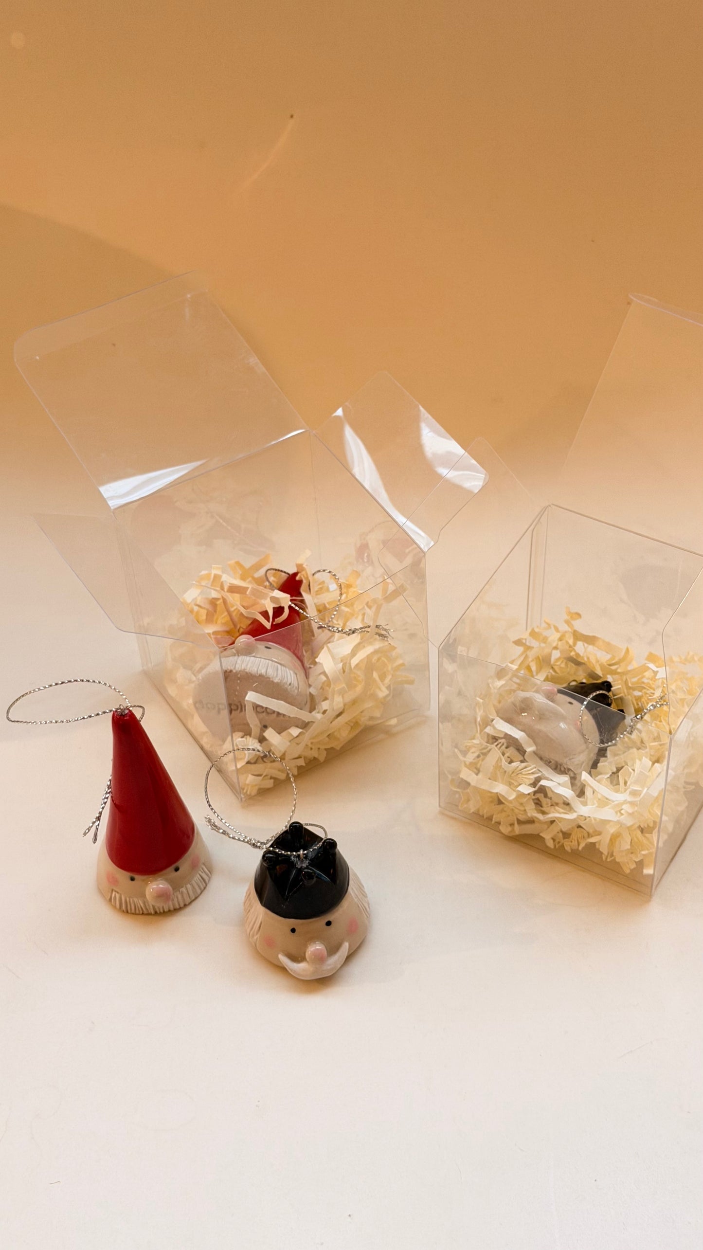 Nutcracker and Santa heads handmade with string for hanging on the Christmas tree