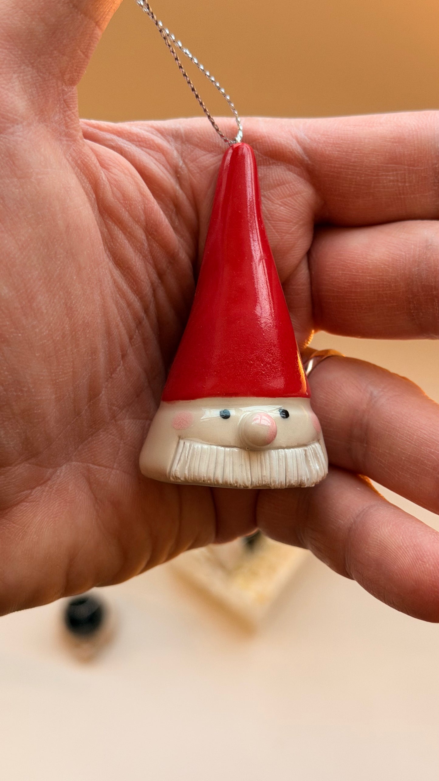 Nutcracker and Santa heads handmade with string for hanging on the Christmas tree