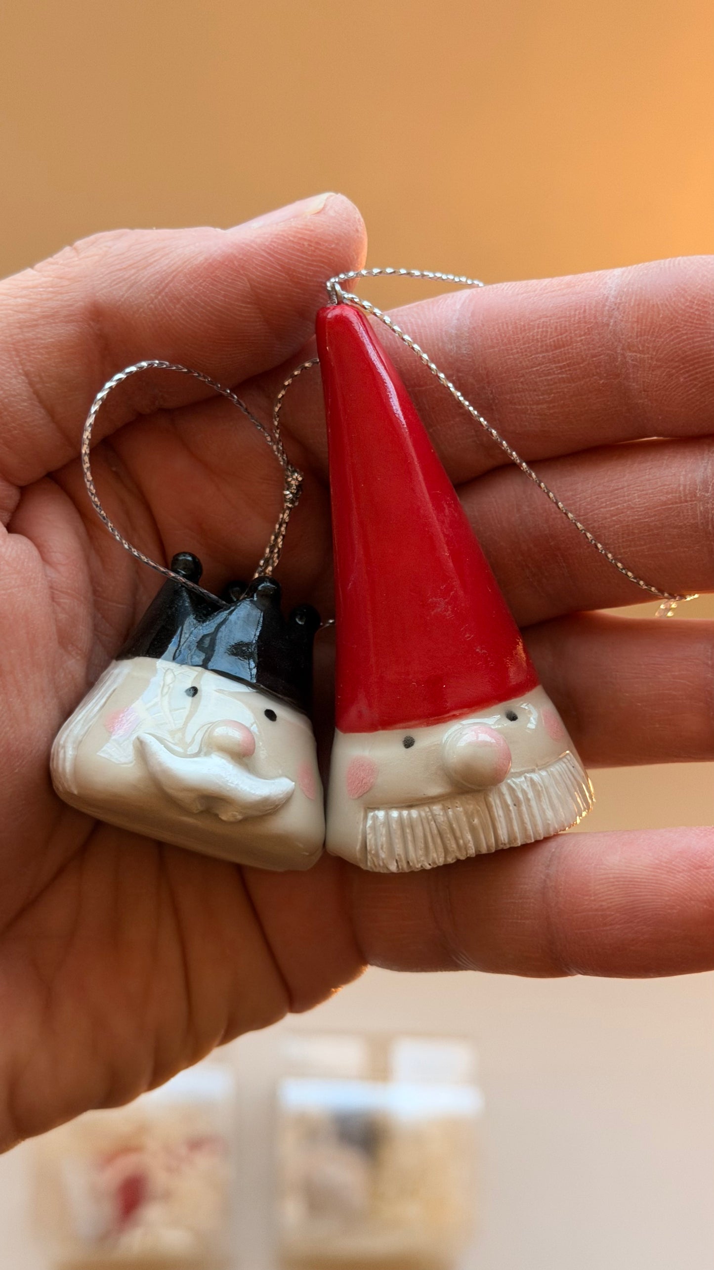 Nutcracker and Santa heads handmade with string for hanging on the Christmas tree