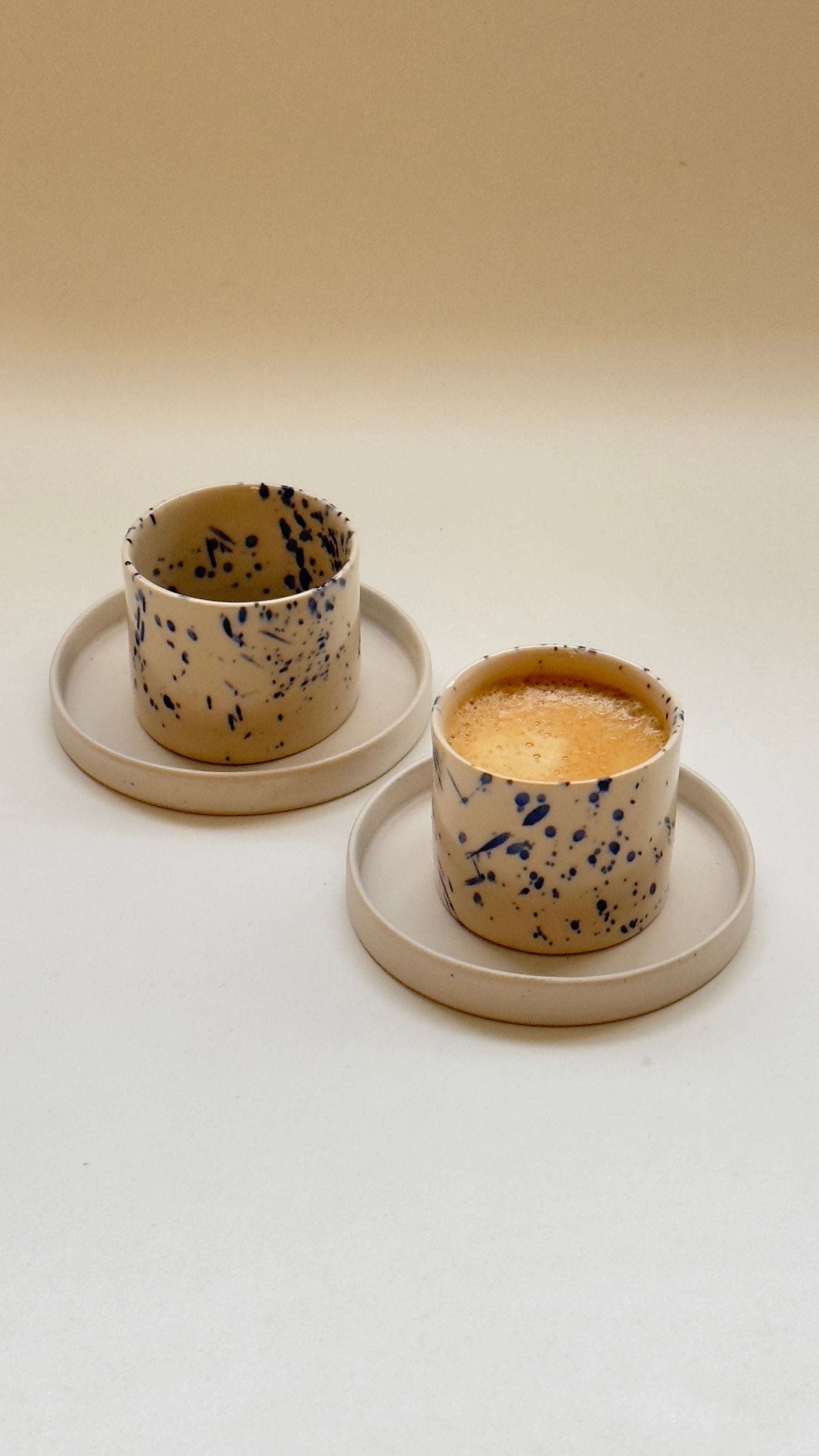 Close-up of handmade stoneware espresso cup texture and glaze
