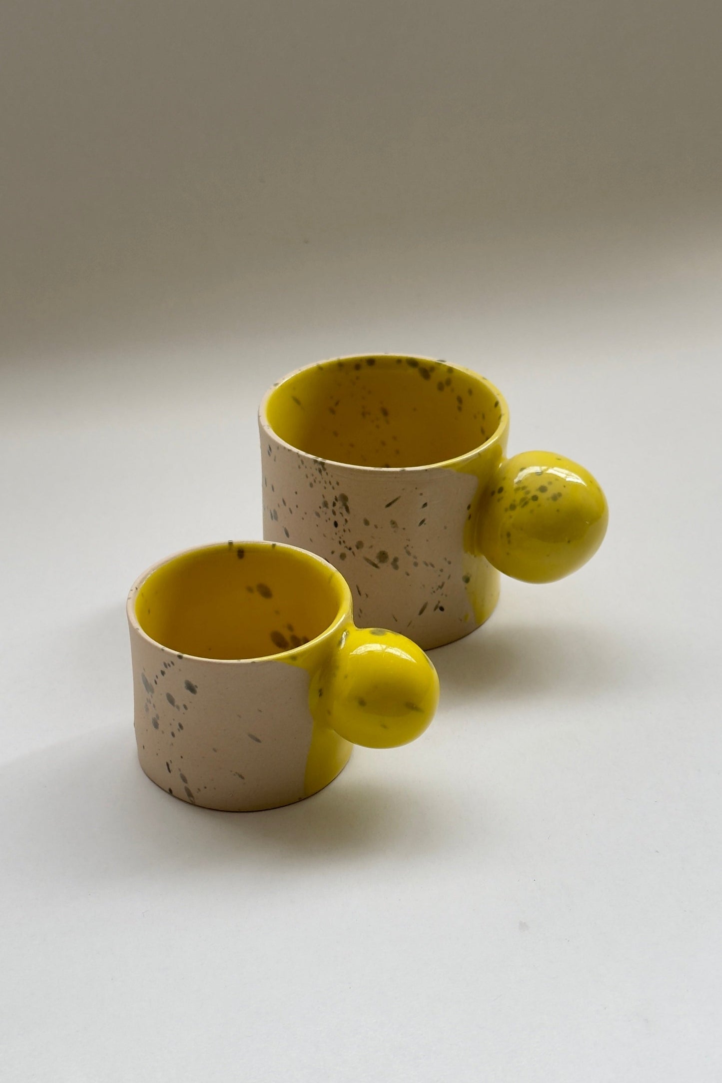 150 ml handmade ball handle beige with yellow ceramic mug