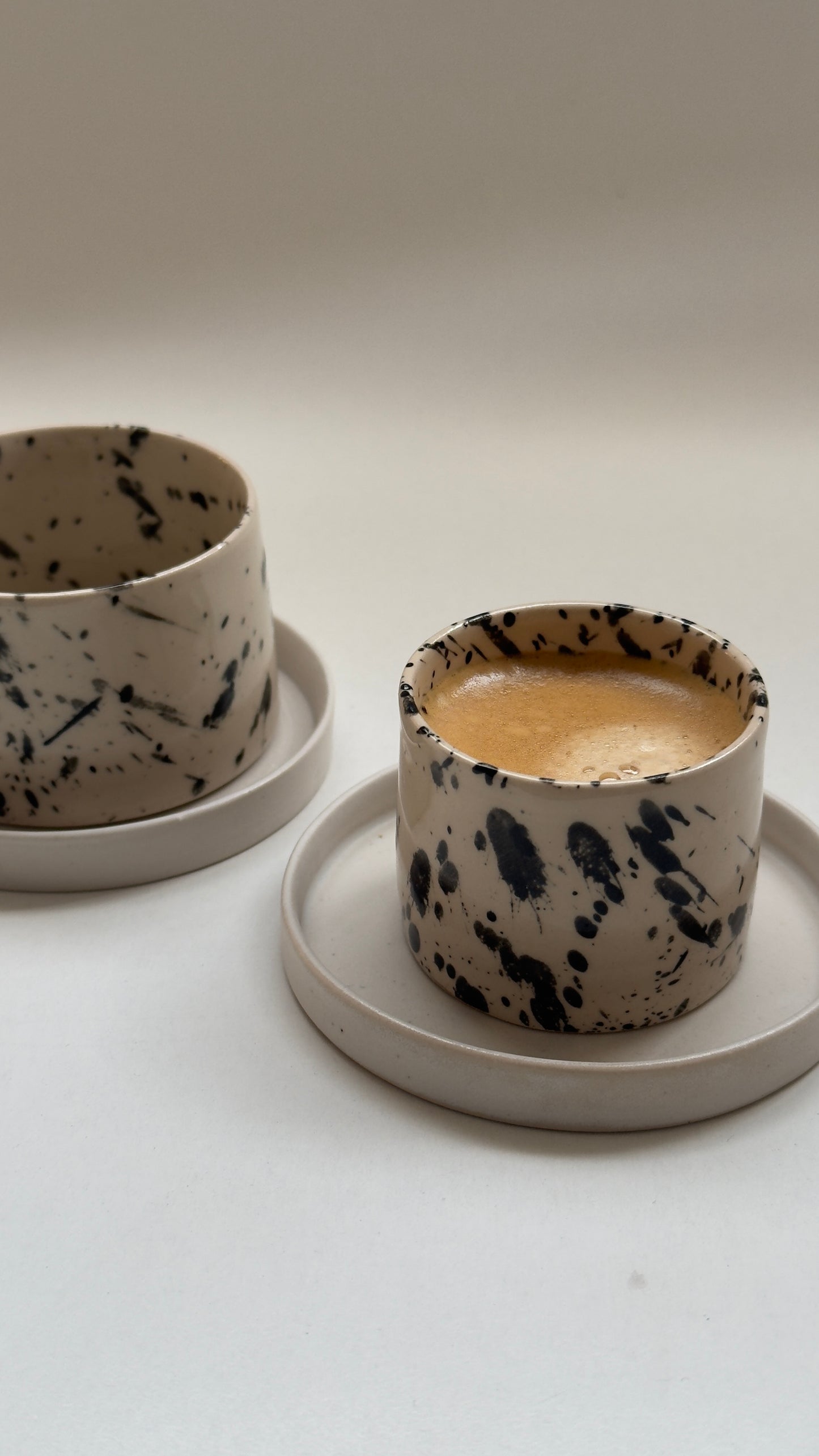 Minimalist handleless stoneware espresso cup for daily coffee rituals