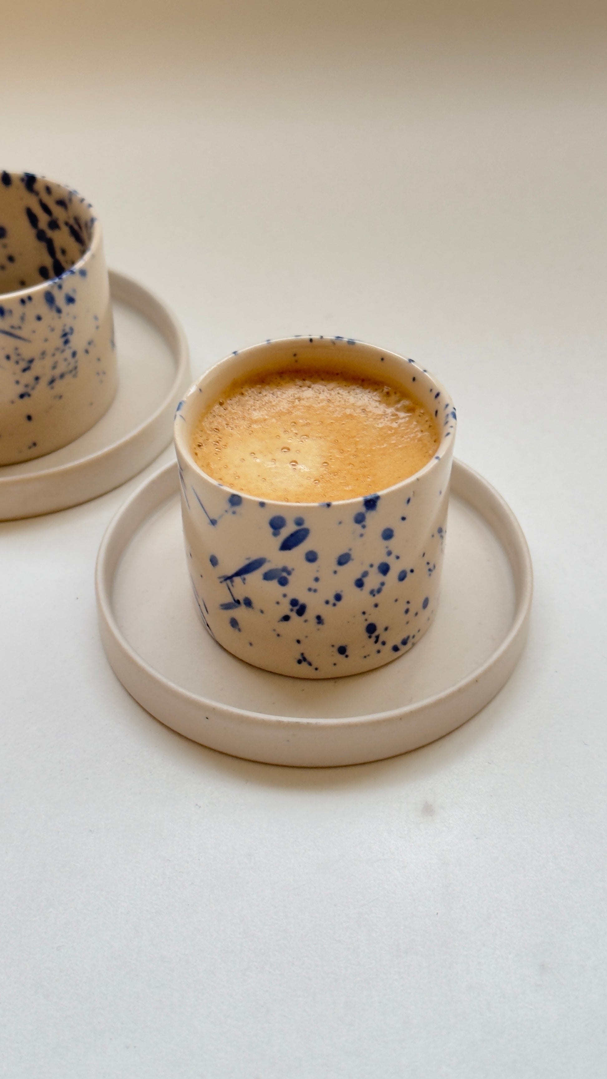 Modern handmade coffee cup and saucer with Scandinavian inspired design