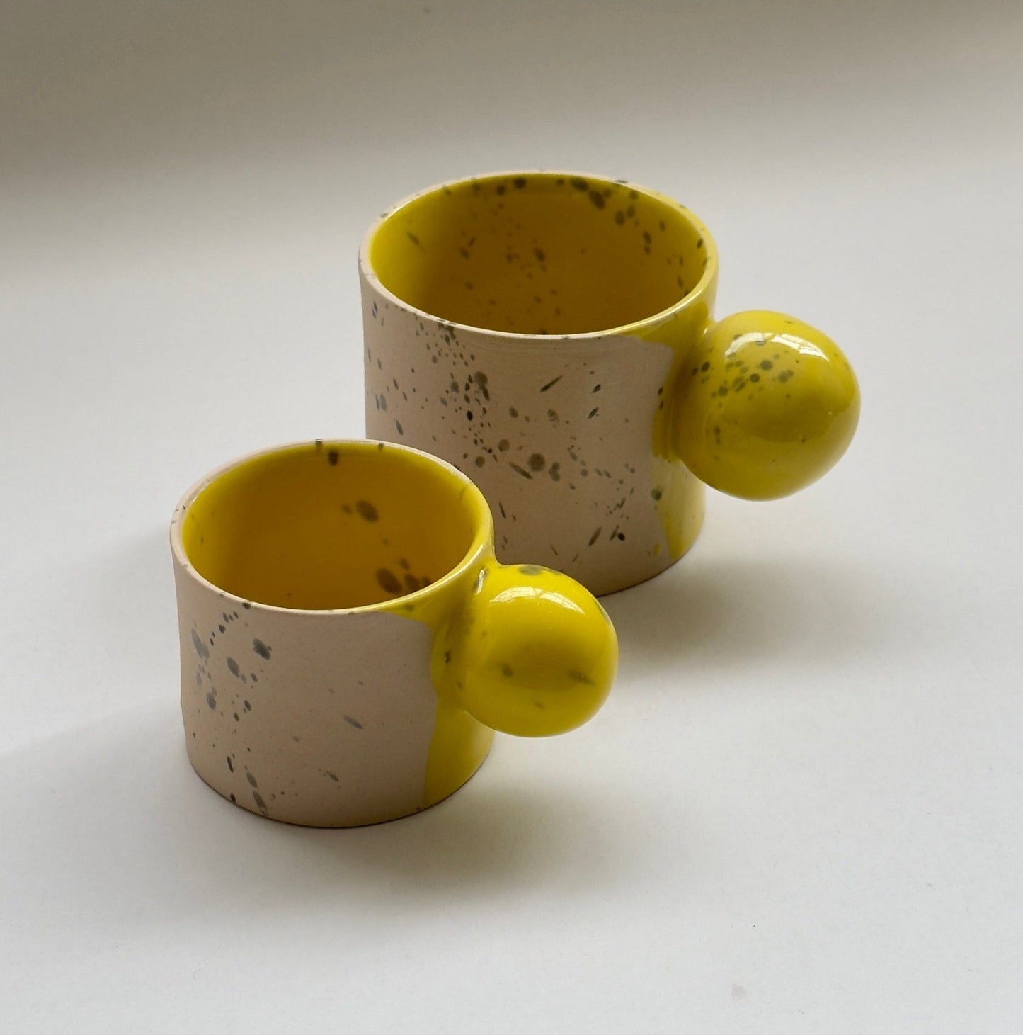 Modern handmade cup and saucer set for coffee and tea rituals
