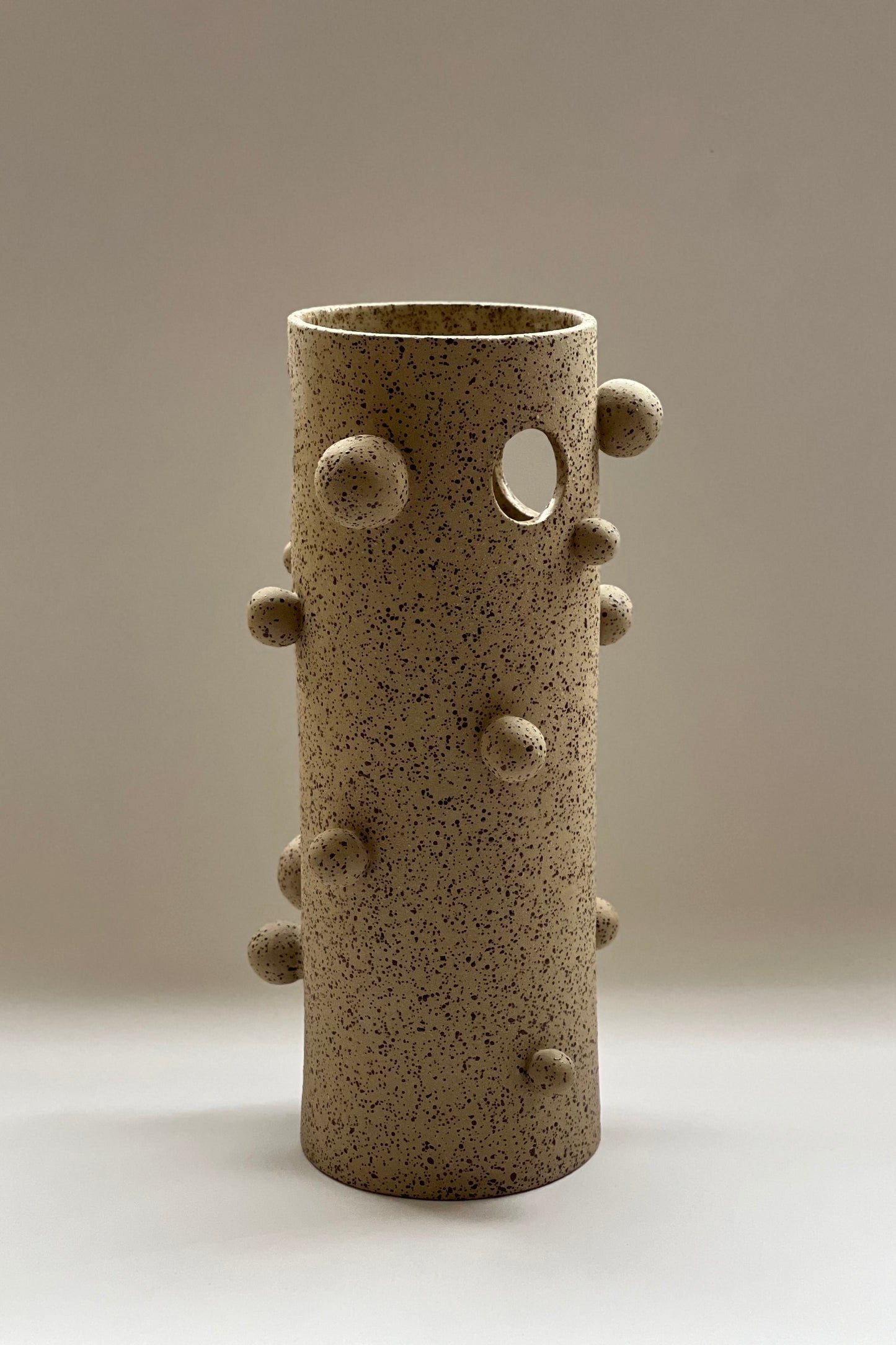 Handmade sculptural stoneware vase with organic bubble details