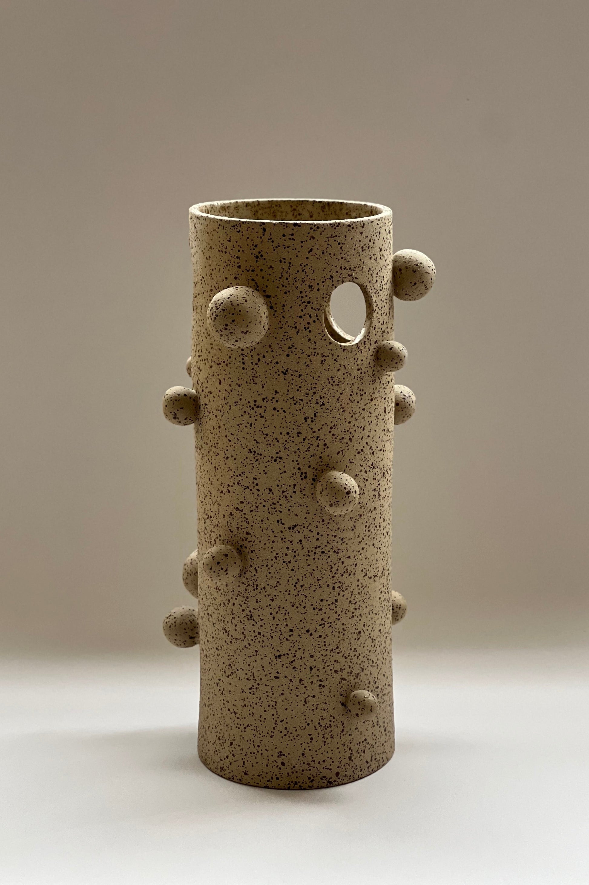 Handmade sculptural stoneware vase with organic bubble details