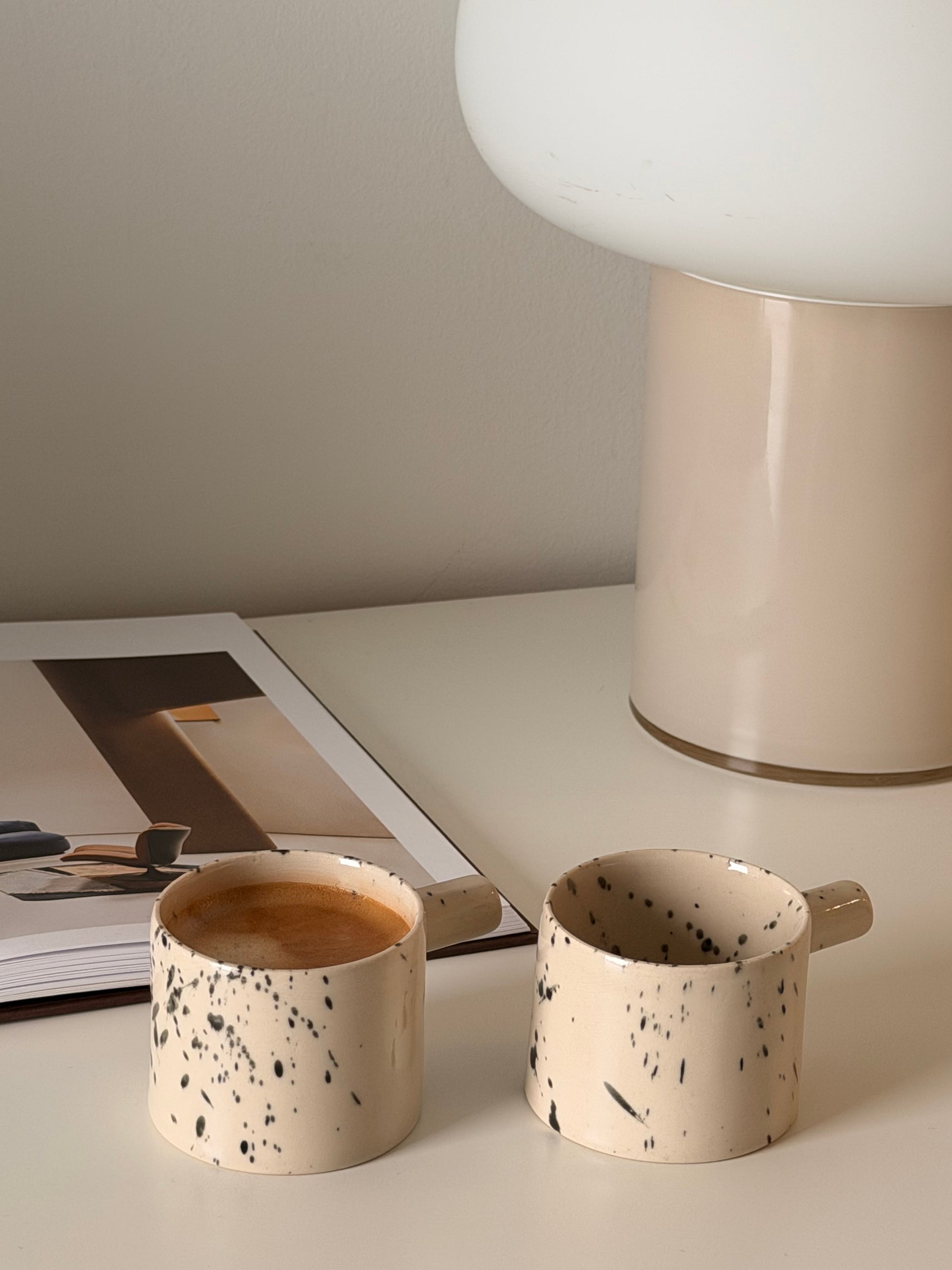 Set of two handmade speckled stoneware espresso cups