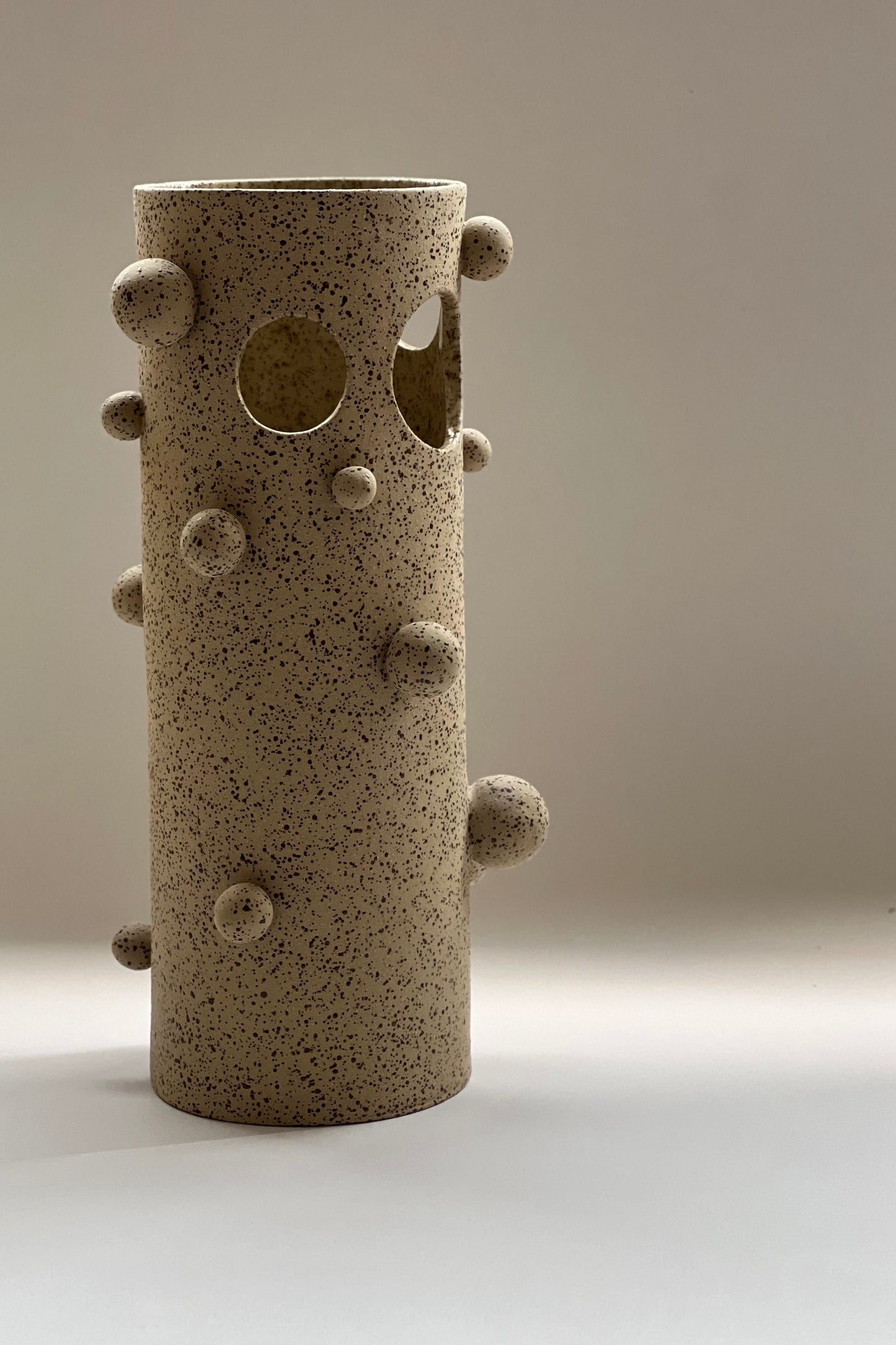 Wabi sabi inspired handmade stoneware vase with natural texture